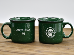 Two "D.O. Speckled Camper Mugs"